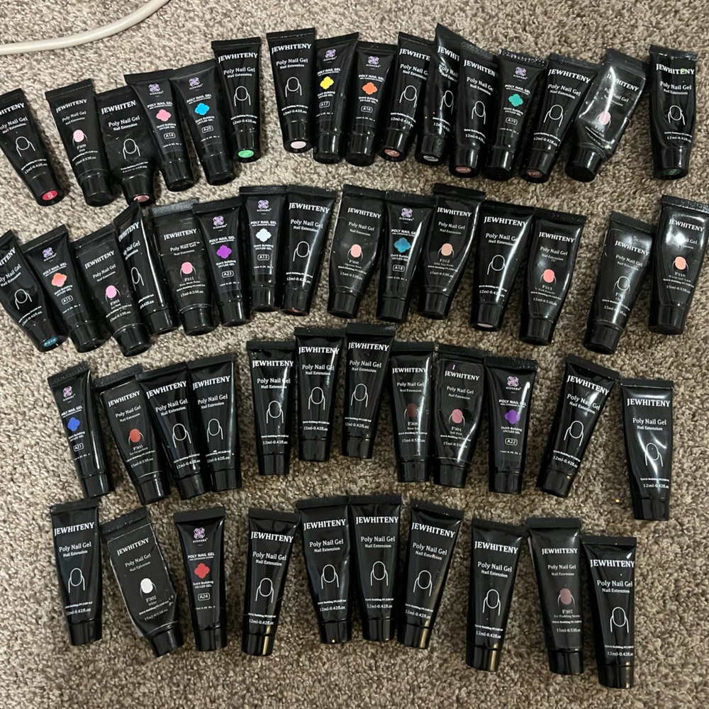 Lot of polygel tubes and nail stickers